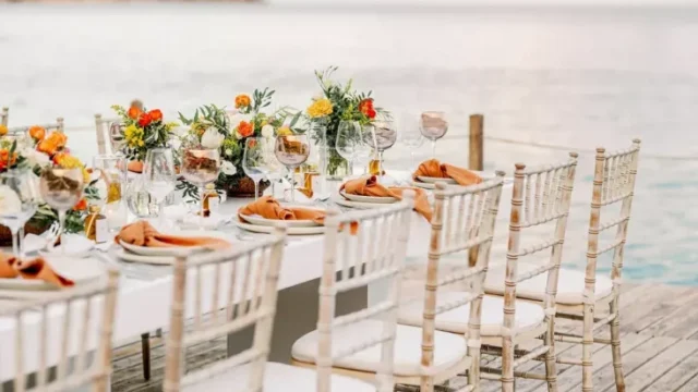 a beautiful table setting with a view over the aegean sea for a greece destination wedding