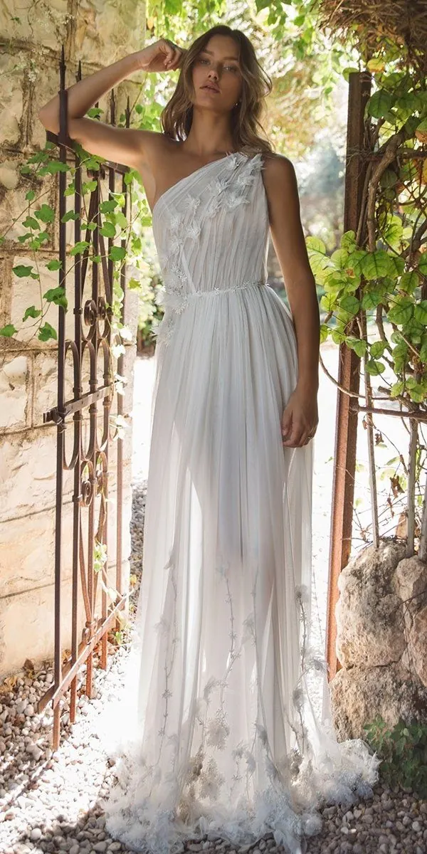 bride wearing a grecian style flowing wedding gown