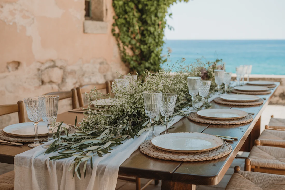 A rustic table setting for a wedding in corfu greece
