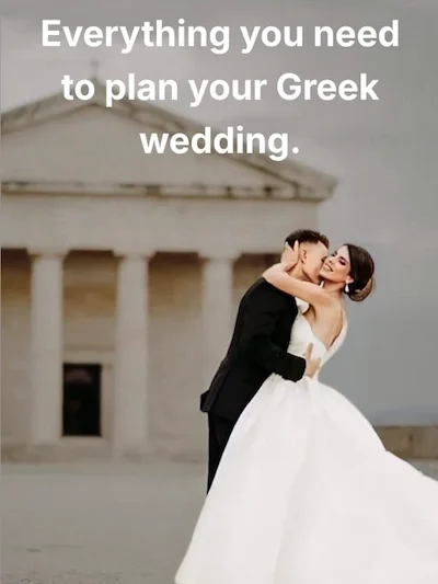Everything you need to plan your Greek wedding: a couple embracing outside a neoclassical Athens building