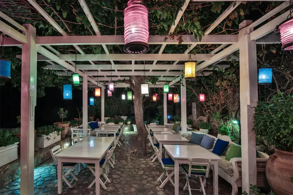 outdoor pergola at night of the Melenos Art Boutique Hotel in rhodes