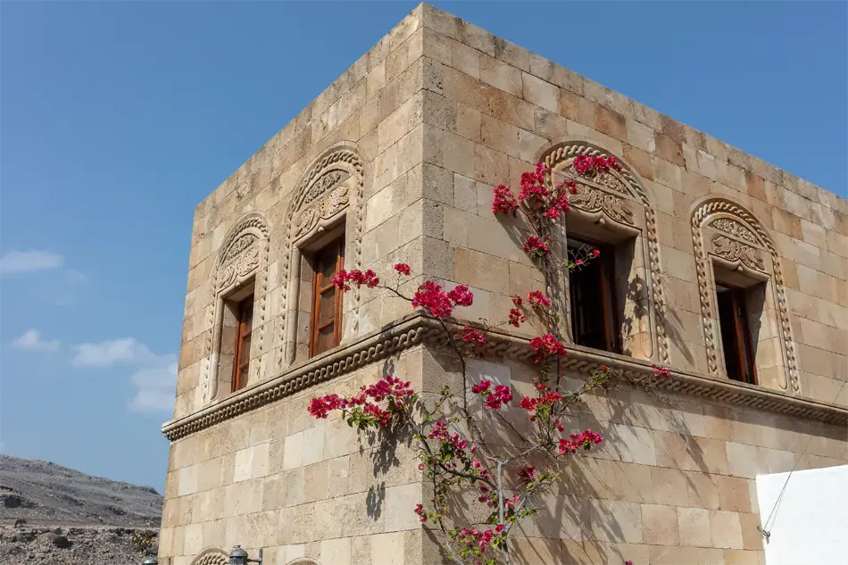 classic limestone walls of the Melenos Art Boutique Hotel setup for a wedding in rhodes