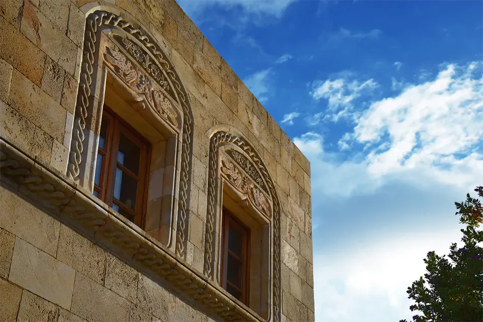 classic limestone walls of the Melenos Art Boutique Hotel in rhodes