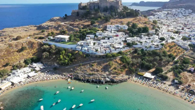 aerial wide shot of the historic mountain and the Melenos Art Boutique Hotel setup for a wedding in rhodes