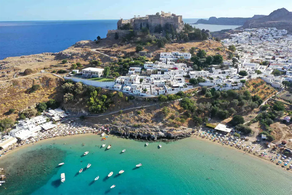 aerial wide shot of the historic mountain and the Melenos Art Boutique Hotel setup for a wedding in rhodes