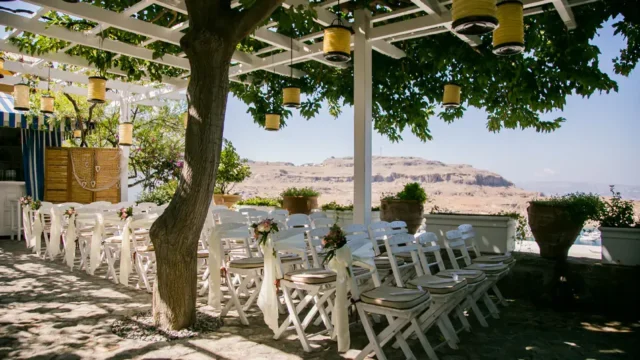 chairs at the Melenos Art Boutique Hotel setup for a wedding in rhodes