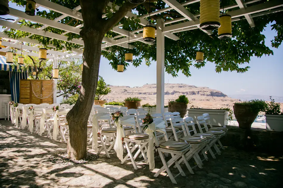 chairs at the Melenos Art Boutique Hotel setup for a wedding in rhodes