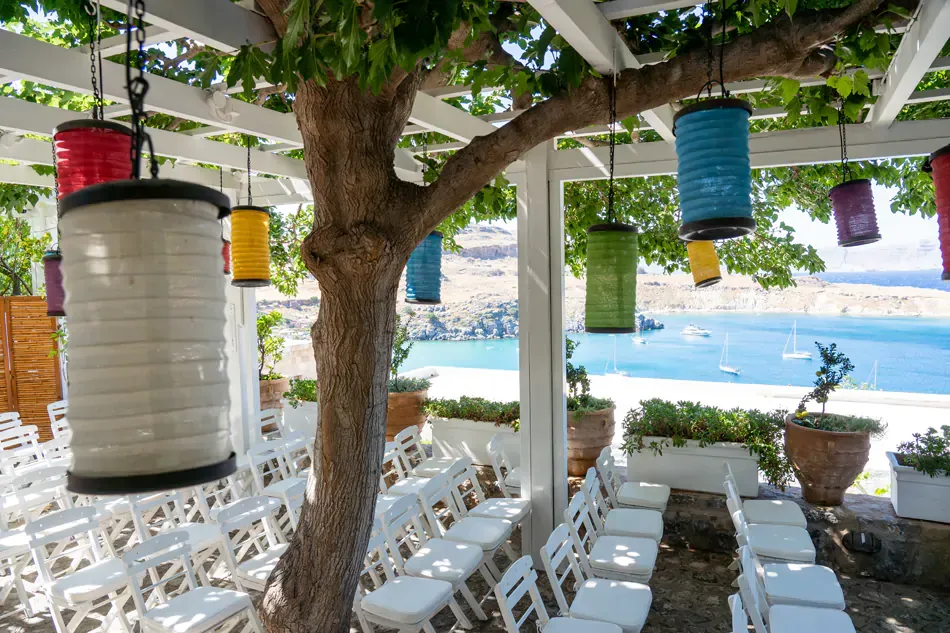 outdoor seating at the Melenos Art Boutique Hotel setup for a wedding in rhodes