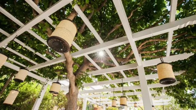 white pergola and hanging lamp at the Melenos Art Boutique Hotel setup for a wedding in rhodes