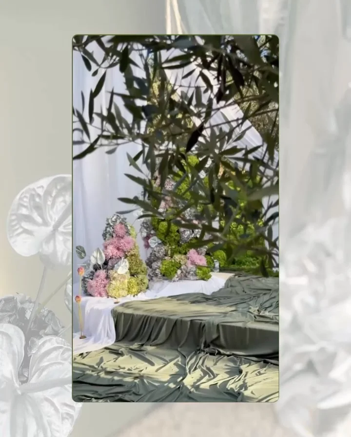 a beautiful flowered table decoration for a wedding in gree