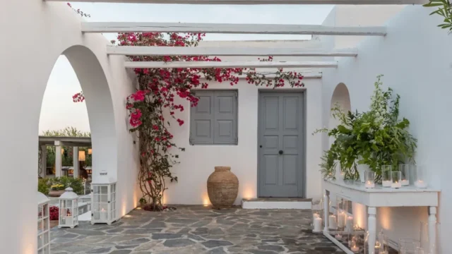 island residence wedding venue on the athens riviera at night main entrance