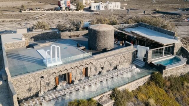 Aerial view of Cavo Ventus wedding venue on the caldera edge at Akrotiri, Santorini
