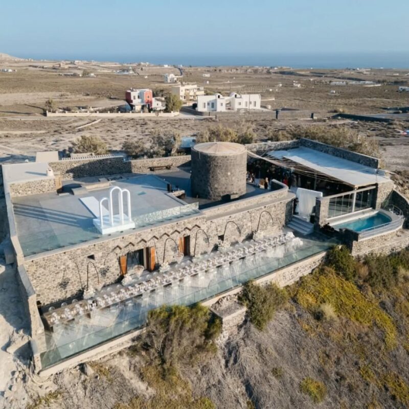Aerial view of Cavo Ventus wedding venue on the caldera edge at Akrotiri, Santorini