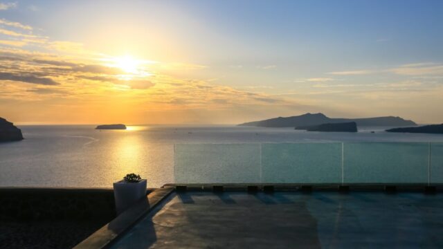 Infinity pool at sunset at Cavo Ventus, Akrotiri, Santorini