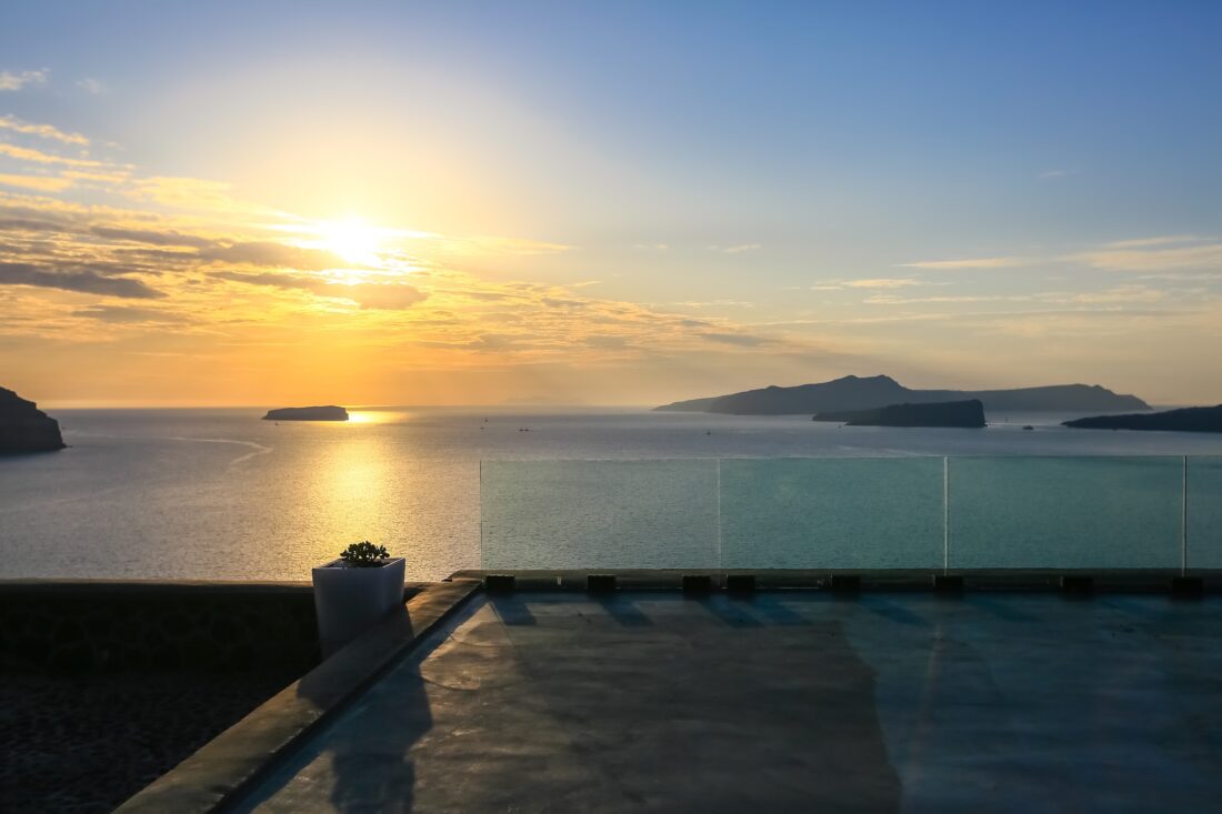 Infinity pool at sunset at Cavo Ventus, Akrotiri, Santorini