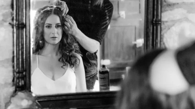 Bridal preparation in front of an antique mirror at Kaminari Village, Rhodes