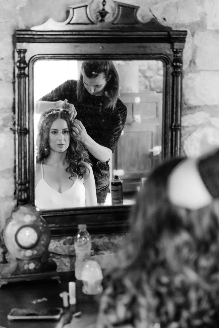 Bridal preparation in front of an antique mirror at Kaminari Village, Rhodes