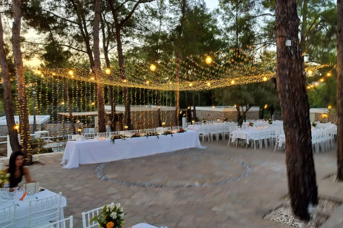 A canopy of fairy lights above the reception tables at Kaminari Village, Rhodes
