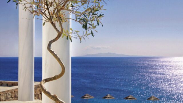 Colonnade framing the sea view at Royal Myconian, Elia Beach, Mykonos