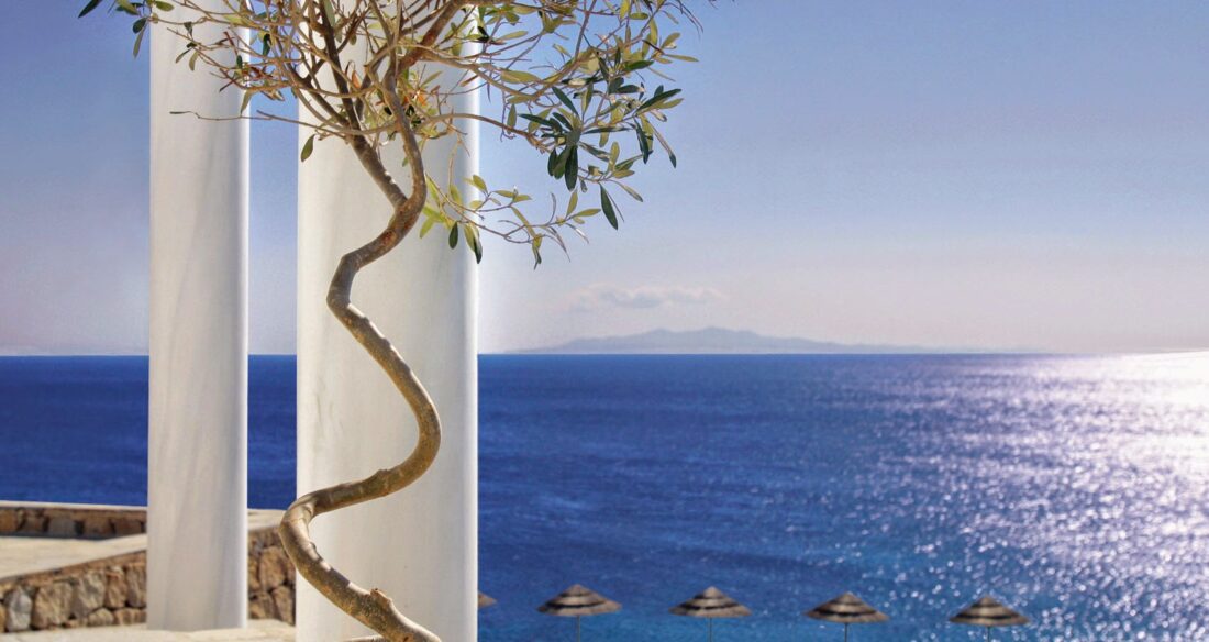 Colonnade framing the sea view at Royal Myconian, Elia Beach, Mykonos
