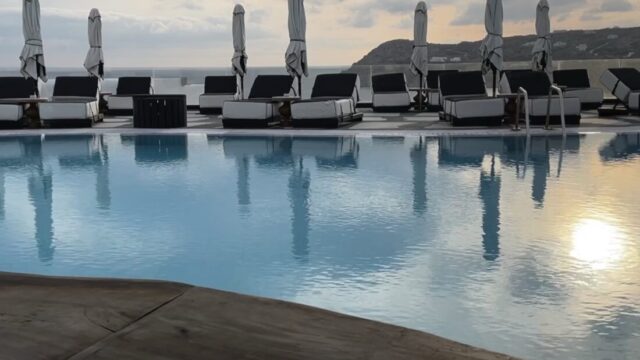 Pool and loungers in the evening at Royal Myconian, Elia Beach, Mykonos